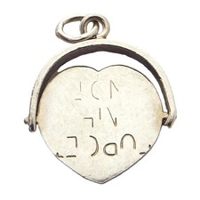 Vintage sterling silver heart shaped spinner charm spins to read FORGET ME NOT