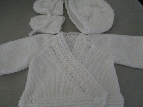 Hand knitted baby - hand,