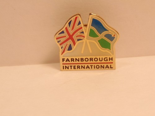 Airshow souvenir pin showing