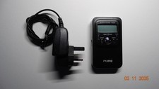 Pure 1500 Pocket DAB/FM  RDS rechargeable radio with charger and new earphones. 