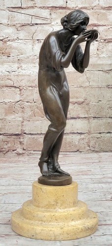Young woman drinking from - young,
