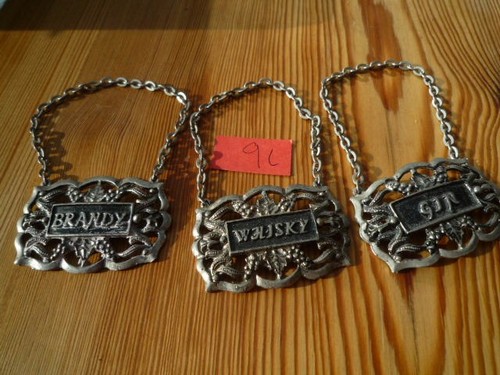 Vintage silver bottle labels - vintage,