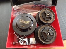 Vintage fishing Mitchell box, spare reels and parts