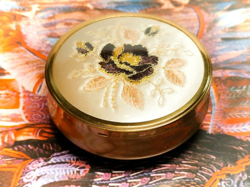 Footed gold tone floral