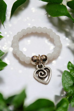 WHITE SEED BEADED SWIRL HEART