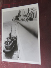 Postcard. Titanic taking on