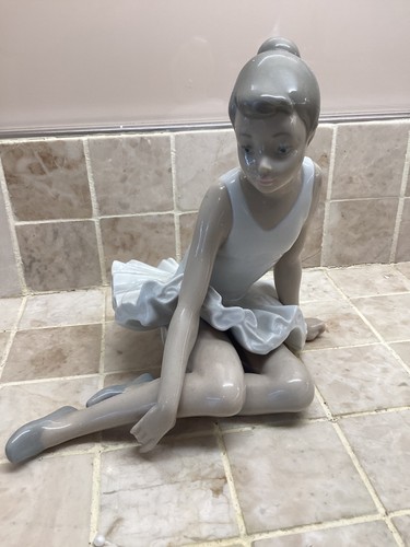 Vintage nao lladro seated - by,