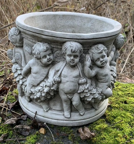 Stone garden cherub plant - garden,