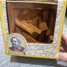 Wooden Puzzle Great Minds. Archimedes Tangram Puzzle With Solution