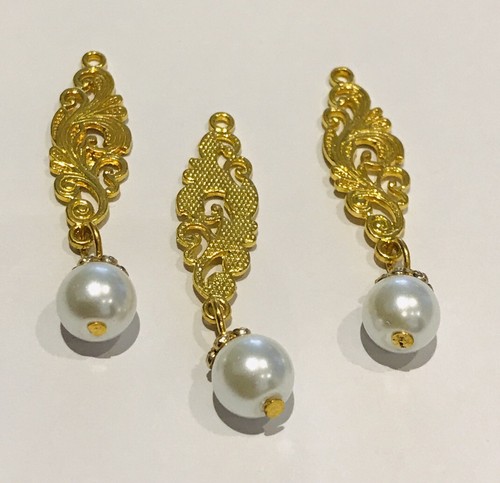 Gold and pearl tassels - and,