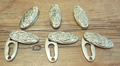 Recliamed brass escutcheon art - recliamed,