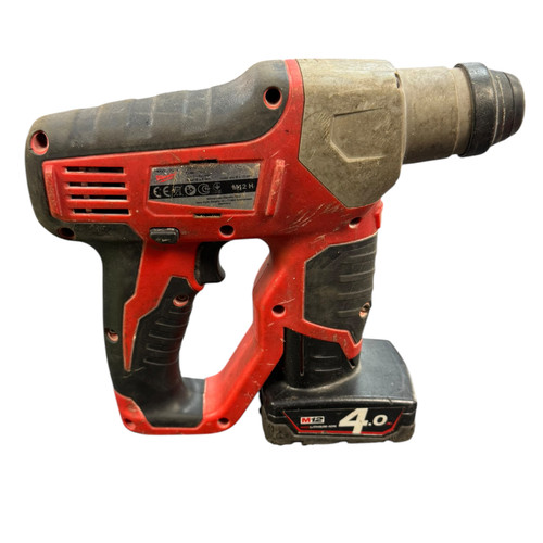 Milwaukee drill and battery - and,
