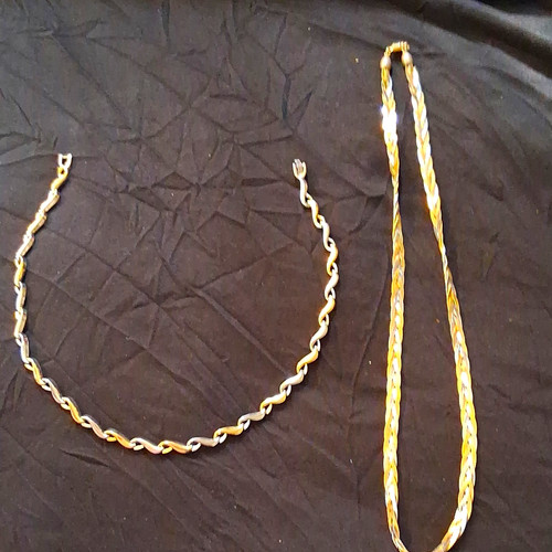 Gold silver tone twisted - &,
