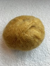 A mix of Kid Mohair (78%)