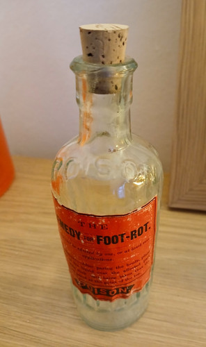 Antique poison bottle clear - poison,