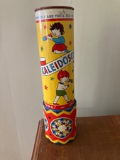 A Vintage 1950s Toy Tin Kaleidoscope by Acme Toys. Made in England.