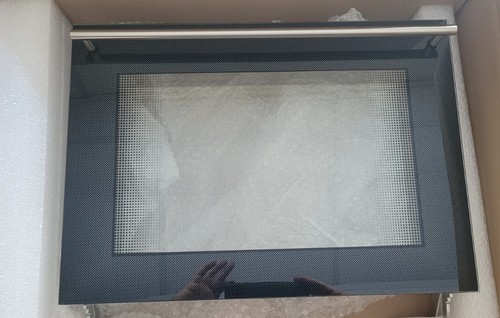 Complete oven door including