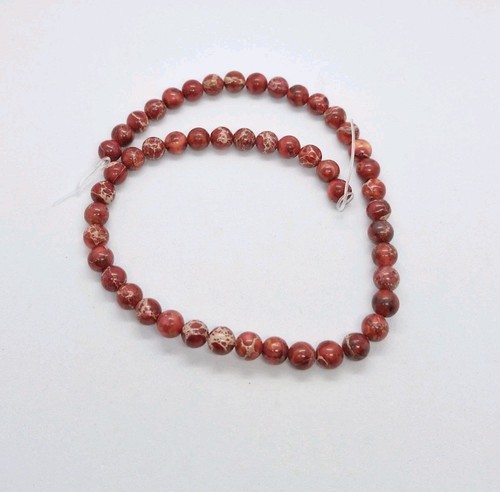 130 cts red - red, rounds