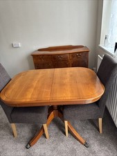 Classic oak dining table and matching sideboard. 