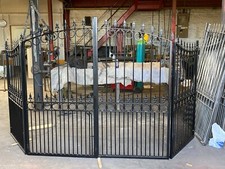 Bi-fold driveway gates