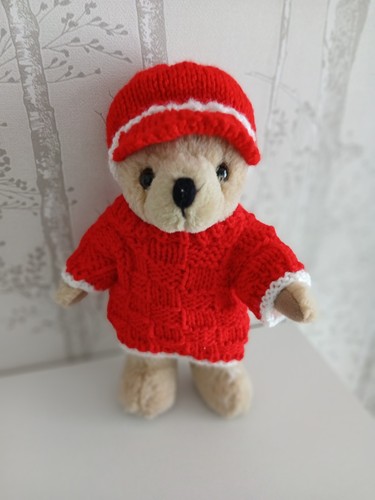 Hand knitted teddy bear - hand,