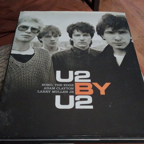 U2 hardback book - by,