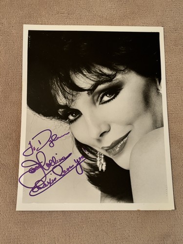 Joan collins hand - collins,