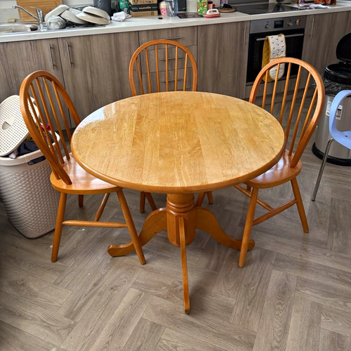 Round wood dining table - wood,
