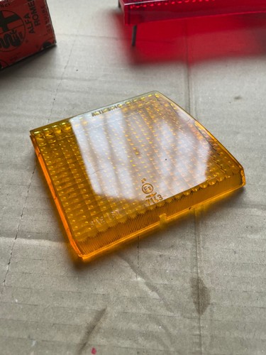 Rear headlight arrow lens - rear,