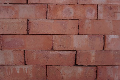Brick slips cut from reclaimed - brick,
