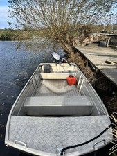 SEA STRIKE aluminium 12ft flat bottomed dingy with outboard. Highly sort after.