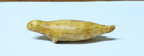 Very old carved eskimo seal - very,