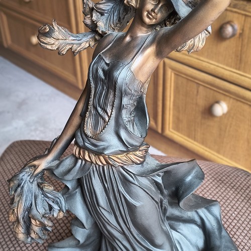 Bronze grey female dancer - &,
