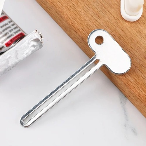 Metal tube toothpaste squeezer - toothpaste,