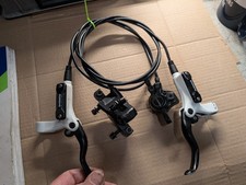 SHIMANO HYDRAULIC BRAKES SPARES OR REPAIRS WHITE LEVERS