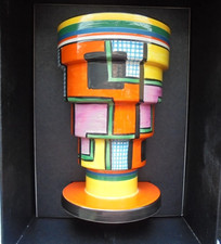A Wedgwood Clarice Cliff stepped vase in handpainted FOOTBALL pattern.