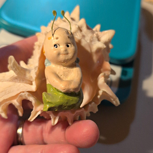 Vintage kewpie doll nestled - kewpie,