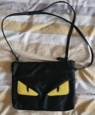 BLACK BAG WITH YELLOW EYES REMOVEABLE ADJUSTABLE STRAP BODY CROSS BAG/CLUTCH 