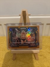 2024 Dusty Rhodes Panini Prizm WWE Orange Parallel #/99