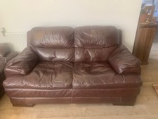 Brown 2 seater faux leather sofa