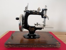 Vintage Miniature Toy Lead Sewing Machine in Bentwood Case.Made in Japan 1933-41