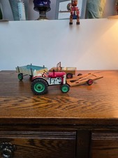 VINTAGE TIN TOYS KDN AND