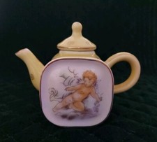 THE MINIATURE TEAPOT