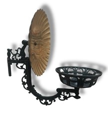 Antique cast iron oil lamp
