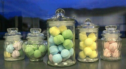 Glass candy jar with - candy,