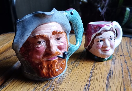 Pair small character jugs - of,