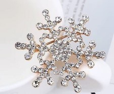 SMALL GOLD TONE SNOWFLAKE