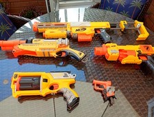 Collection of Nerf N-Strike Guns with 54 Foam Pellets