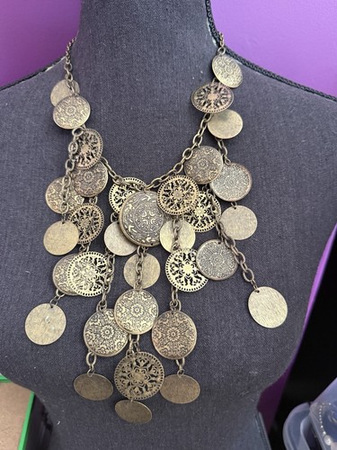 Antique gold tone coin - gold,