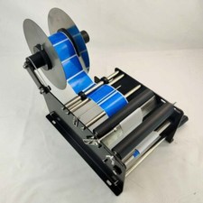Manual Round Bottle Labeling